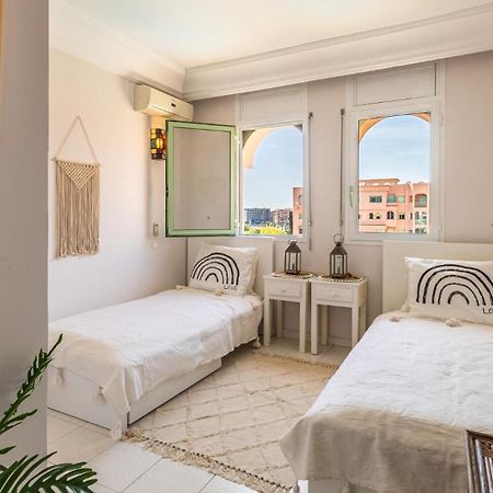 Charming 2-Bed Oasis Pool View Apartment มาร์ราเกช ภายนอก รูปภาพ